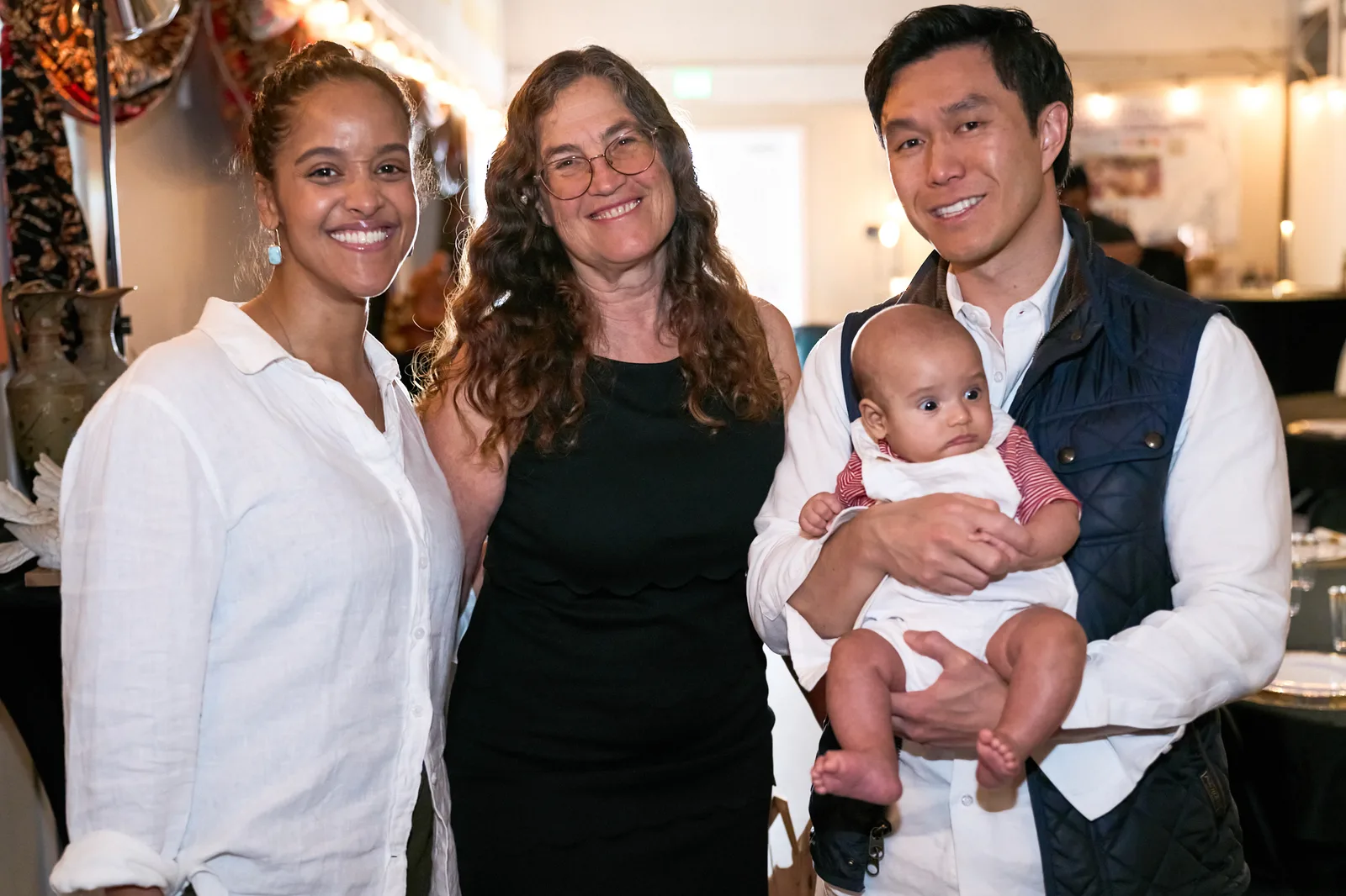 A family smiling together at the 2026 Water for Life Benefit Gala.