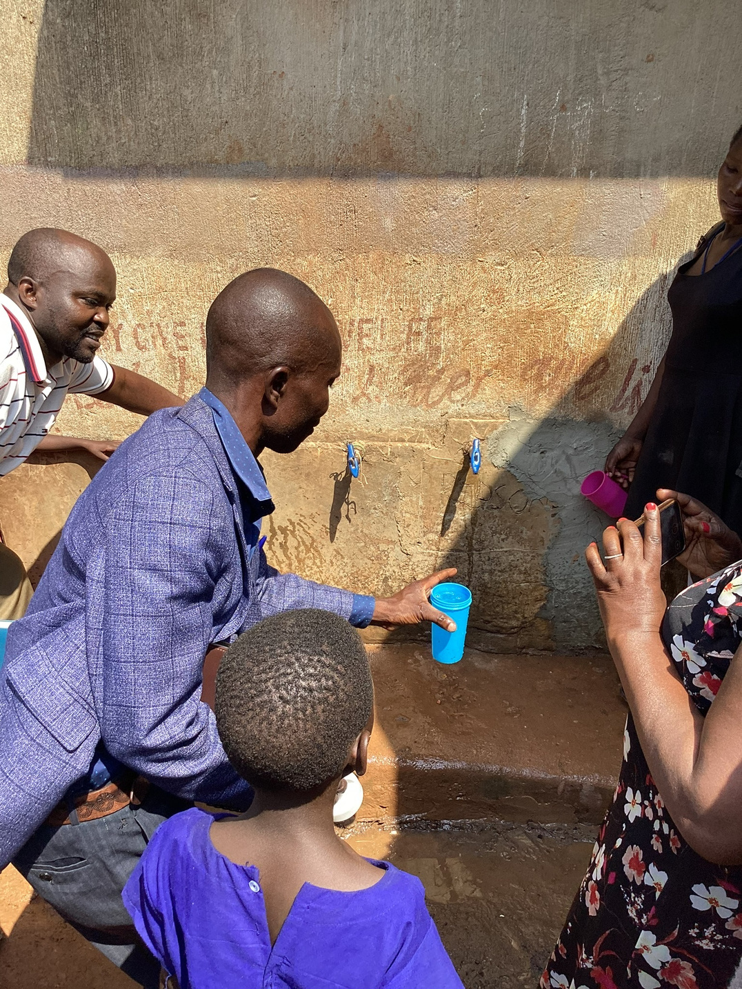 Children at a completed Give Water Give Life well.